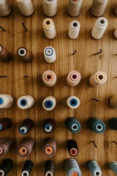 Sewing threads as a multicolored background close up Stock Photos