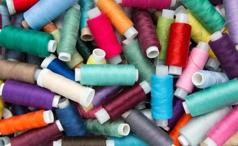 Sewing threads multicolored background Stock Photos