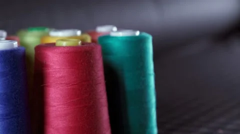 Sewing Threads On Spool. Colorful spools of thread in textile factory 库存影片 68951485