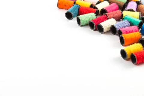 Sewing threads on white background Stock Photos
