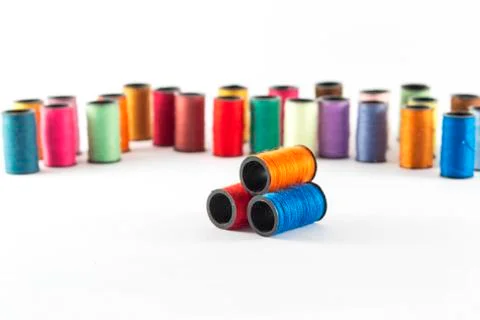Sewing threads on white background Stock Photos
