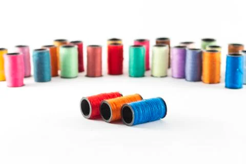 Sewing threads on white background Stock Photos