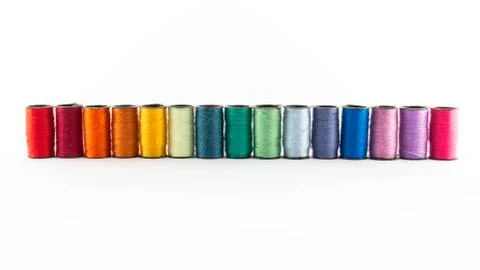 Sewing threads on white background Stock Photos