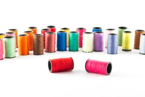 Sewing threads on white background Stock Photos