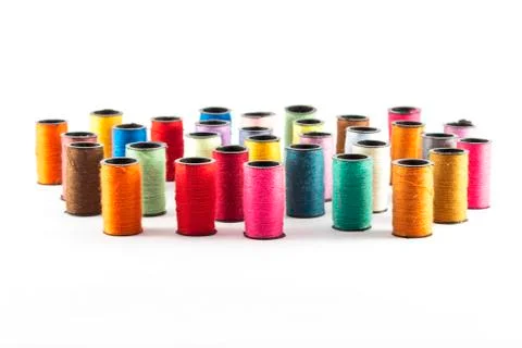 Sewing threads on white background Stock Photos