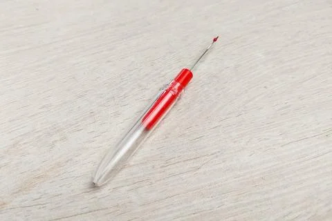 A sewing tool thread handler to open wrong stitches Stock Photos