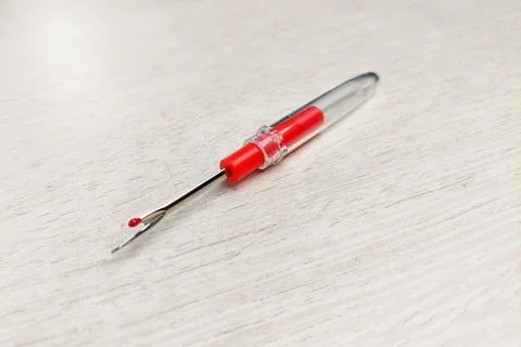 A sewing tool thread handler to open wrong stitches Stock Photos