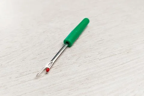 A sewing tool thread handler to open wrong stitches Photos