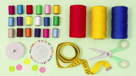 Sewing Tools and Accessories with Thread Spools in 4K Footage Stockbeeldmateriaal 341501666