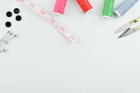 The sewing tools over white background with copy space. Stockfoto's