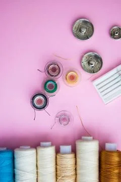 Sewing tools on the pink background with copy space Stock Photos