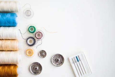 Sewing tools on the white background with copy space Stock Photos
