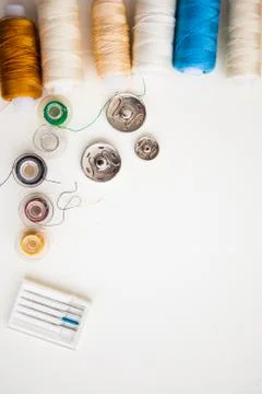 Sewing tools on the white background with copy space Stock Photos