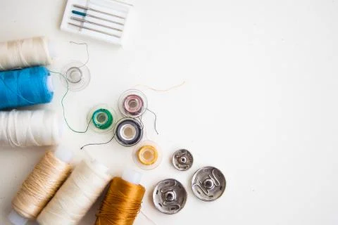 Sewing tools on the white background with copy space Stock Photos