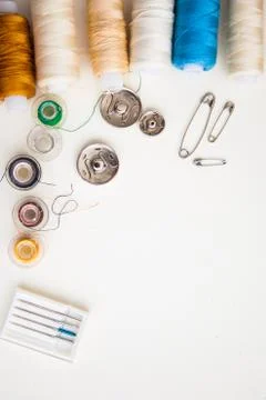 Sewing tools on the white background with copy space Stock Photos