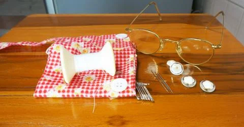 Sewing tools  on woden table Stock Photos