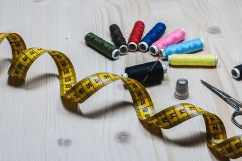 SEWING TOOLS ON WOOD BACKGROUND 2 Stock Photos