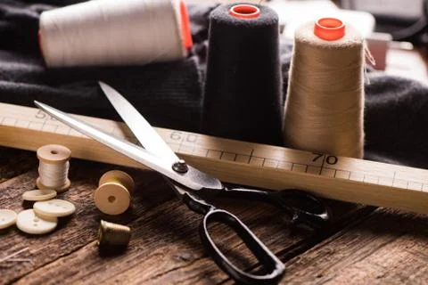 Sewing tools on wooden table Stock Photos