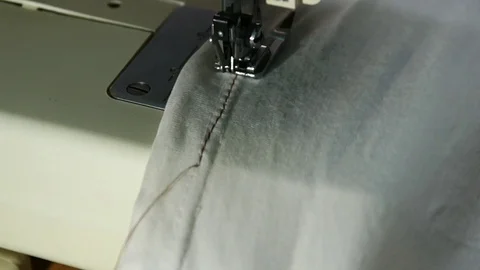 Sewing white shirt with brown thread 스톡 동영상 111506203