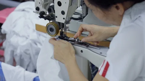 Sewing of white shirt Stock Footage 89717138
