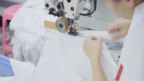 Sewing of white shirt Stock Footage 89717235