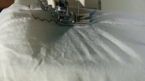 Sewing zigzag pattern on white shirt 스톡 동영상 111506254