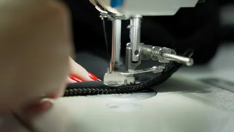 Sewing zipper to material. Concept of precision sewing. Stock Footage 288031602