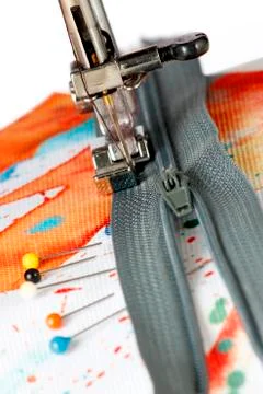 Sewing on a zipper Stock Photos