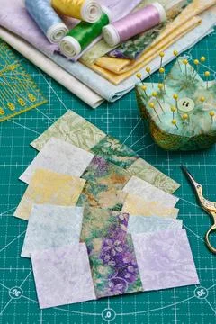 Sewn square pieces of fabric, a stack of fabrics Fotos de archivo