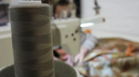 Sews on sewing machine 10 Stock Footage 33452958