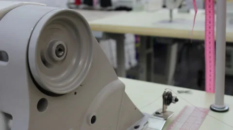 Sews on sewing machine 5 Stock Footage 33311626