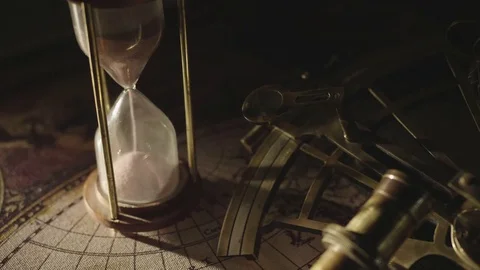 Sextant hourglass old map 2 10 Stock Footage 83318486