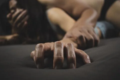 Sexual abuse is a problem social issues concept, Man's hand holding a woman Stock Photos