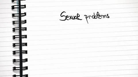 Sexual problems handwriting  text on paper, on office agenda. Copy space. Stock Photos