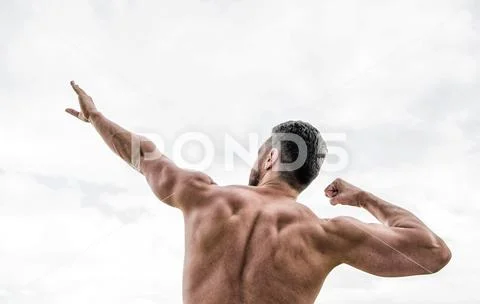 Sexuality and moving concept. Athlete with bare torso. Fitness and sport Stock Photos