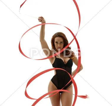 Sexy artistic gymnast posing with ribbon Stock Photos