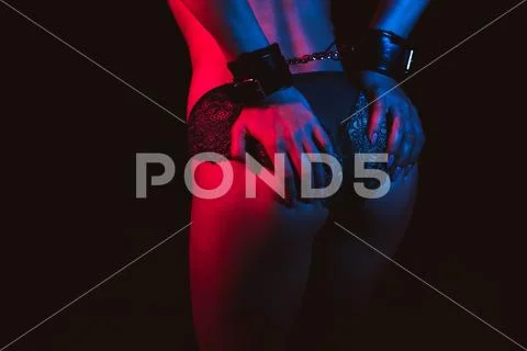 Photograph Sexy big ass slave girls with hands in leather  