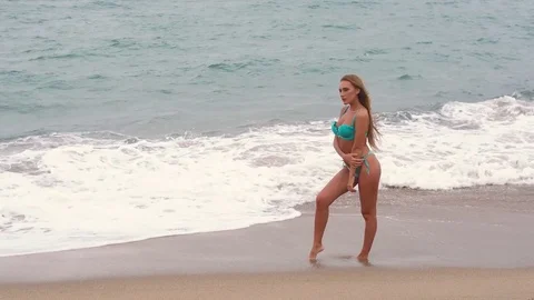 Sexy bikini model posing on the beach. vietnam Stock Footage 72165819