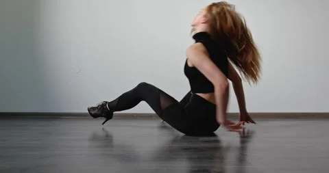 Sexy blonde dancing, female performance of sensual seductive movements Stock Footage 280480163