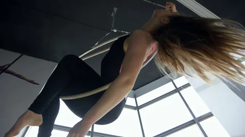 Sexy blonde dancing on the pole in the white dance studio Vídeos de archivo 73227057