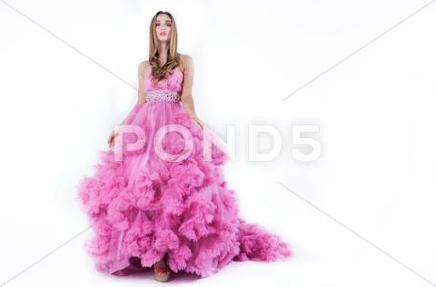 Sexy blonde in pink dress Stock Photos