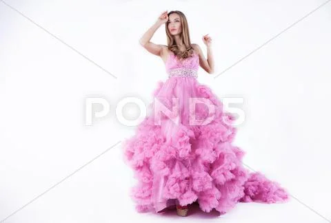 Sexy blonde in pink dress Stock Photos