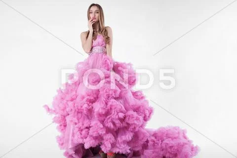 Sexy blonde in pink dress Stock Photos