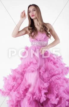 Sexy blonde in pink dress Stock Photos