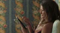 sexy business woman working with her tablet in hotel room HD Footage
