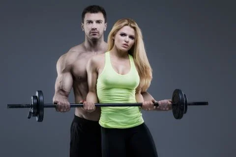 Sexy exerciser couple Stock Photos