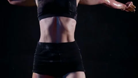 Sexy female dancer is dancing alone in dark studio, contemporary choreography Stock Footage 169244484