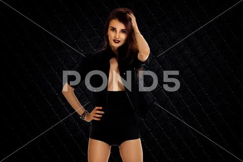 Sexy girl with big brests in jacket and high panties Stock Photos