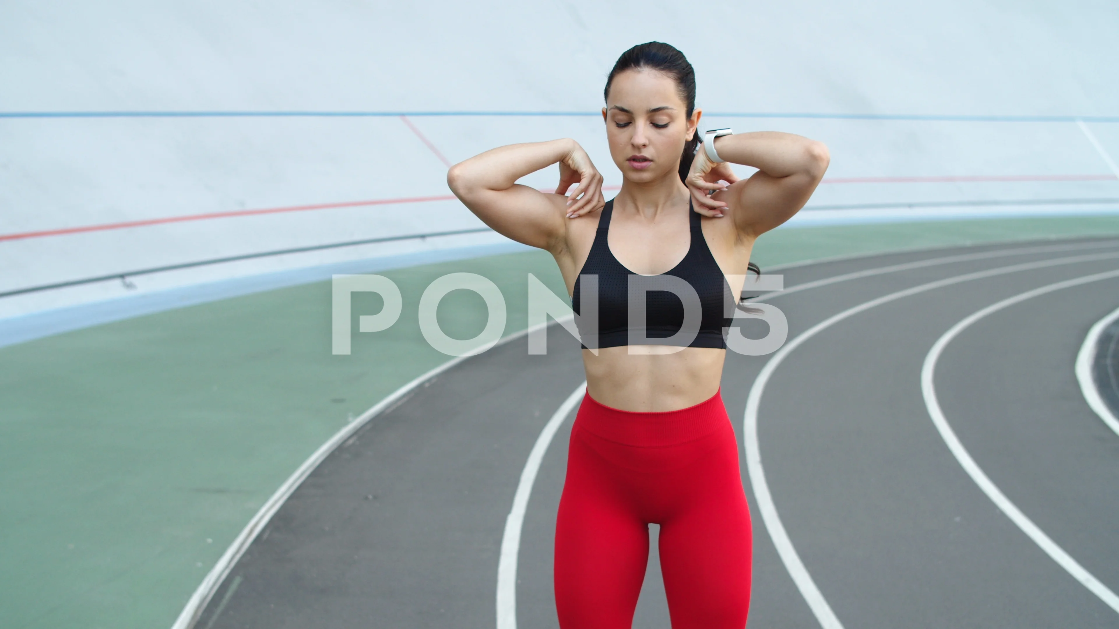sexy athletic woman stretching exercises outdoors Stock Photo by