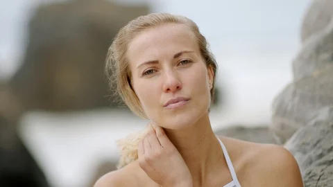 Sexy girl wearing a bikini at the beach | Stock Video | Pond5